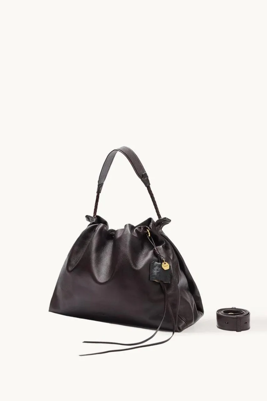 Sculptural accessories trend 2026 handbag design